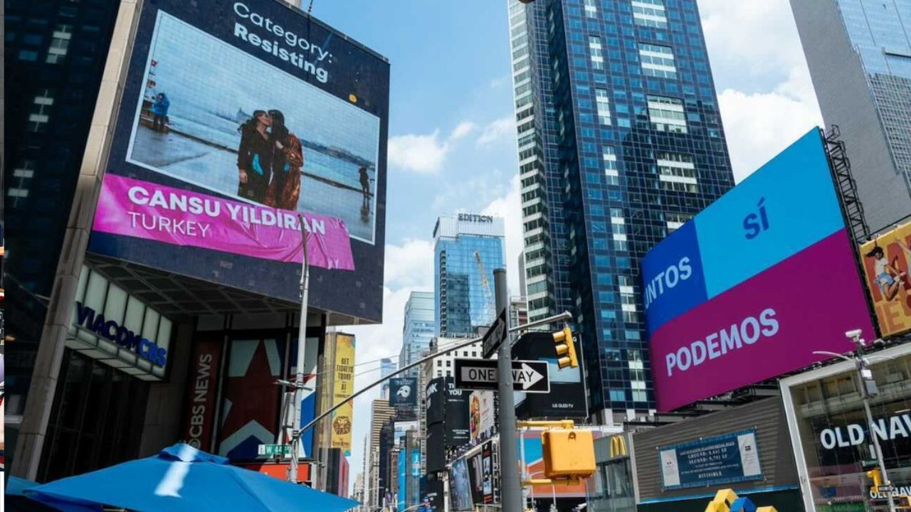 Photo of LGBT activists from Turkey on billboard in Times Square