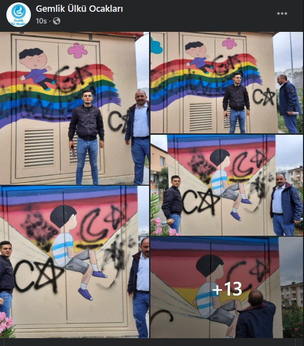 Members of Turkish fascist group Grey Wolves graffiti over rainbow mural