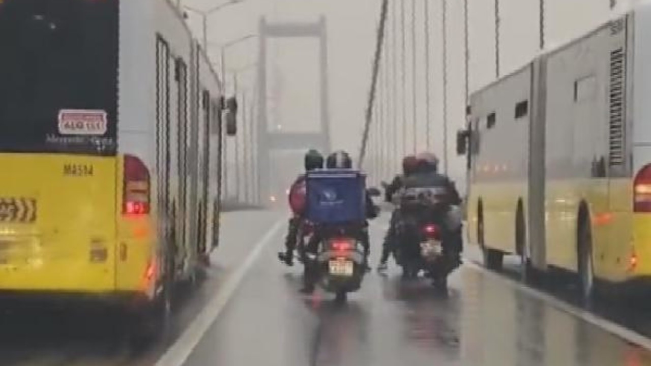 Solidarity saves lives: Bus drivers protect motorcycle couriers against powerful winds on bridge
