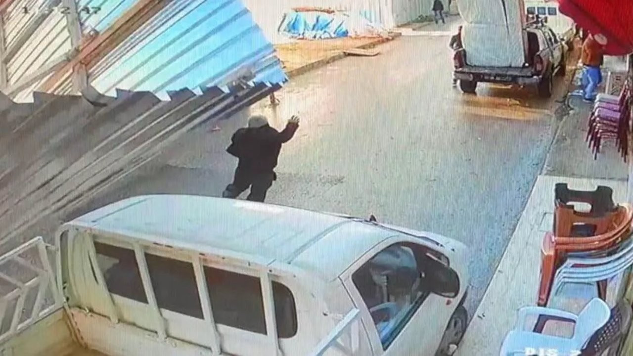 Man narrowly escapes being crushed by collapsing panel during high winds in Istanbul
