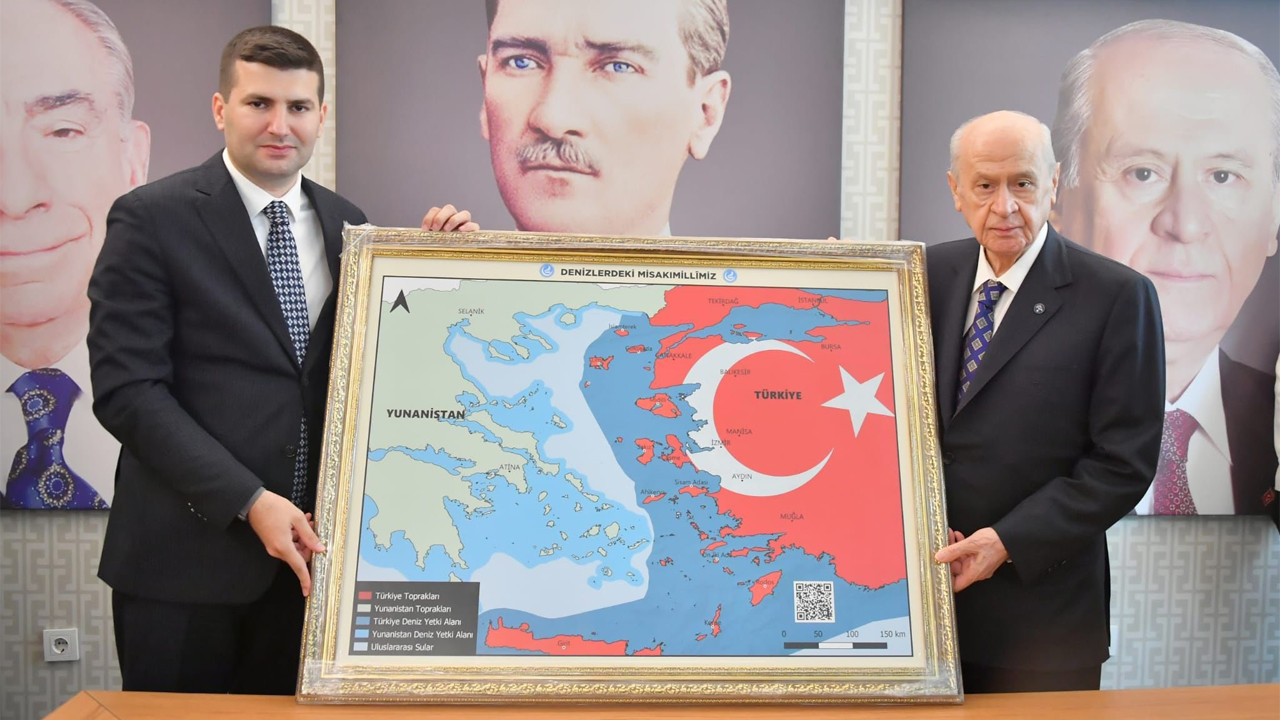 Greek PM slams ultranationalist MHP leader for posing with map showing Greek islands as Turkish