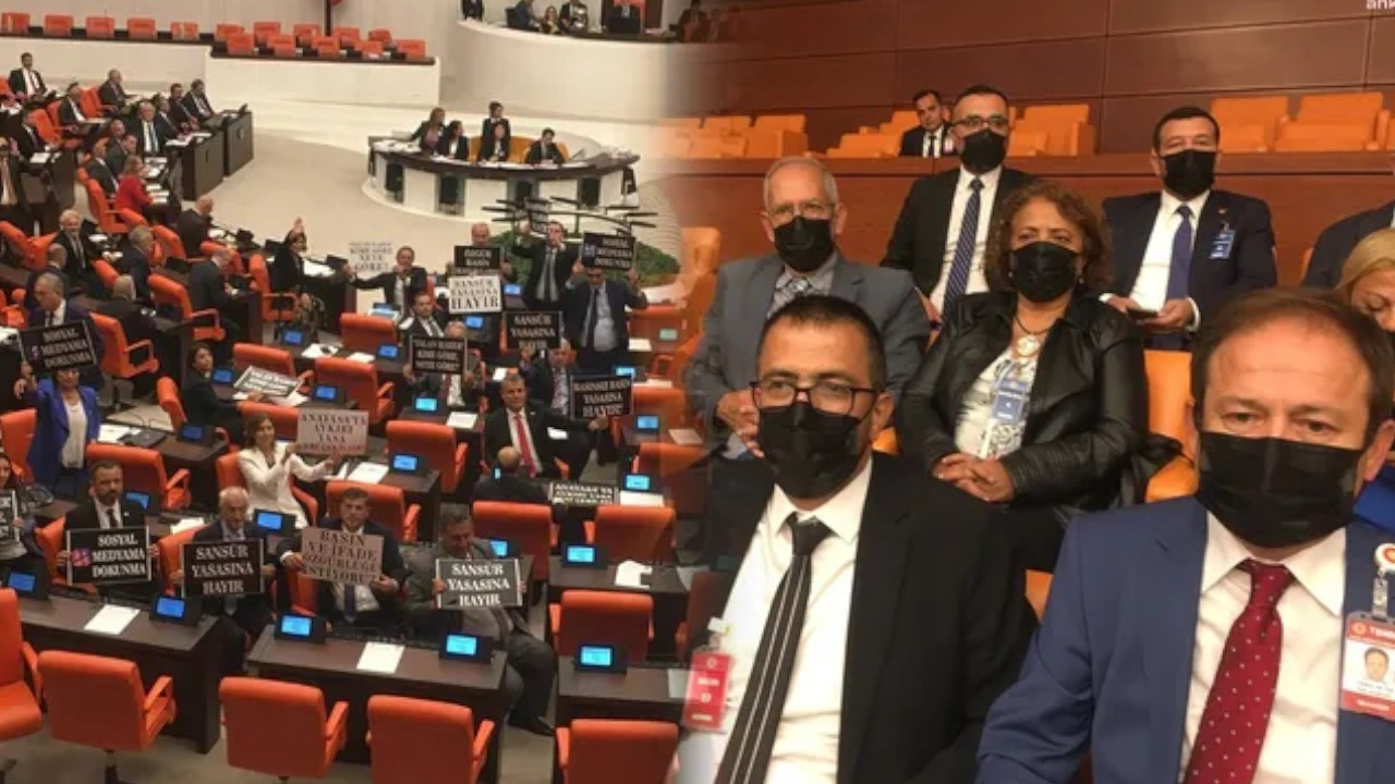 Turkish MPs, journalists protest ‘disinformation law’ in parliament