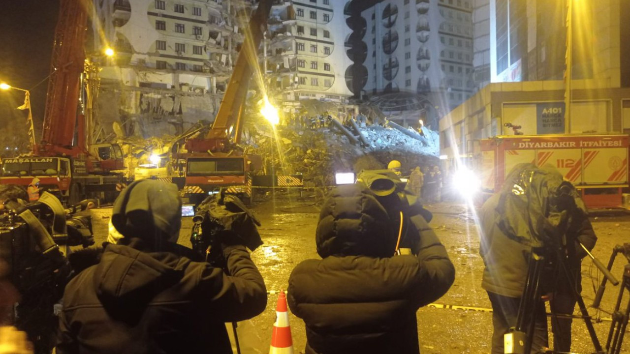 Journalists reporting earthquake tragedy on ground under attack by authorities