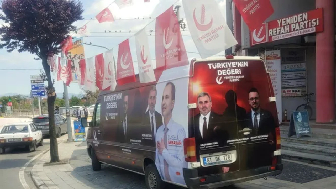 Turkish Islamist party censors woman MP candidate's picture on election bus
