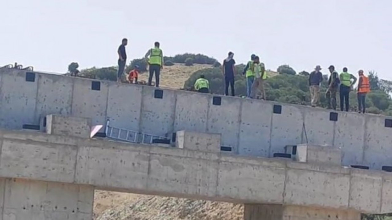 Workers in Turkey secure unpaid wages after 12-day strike on 40-meter-high viaduct