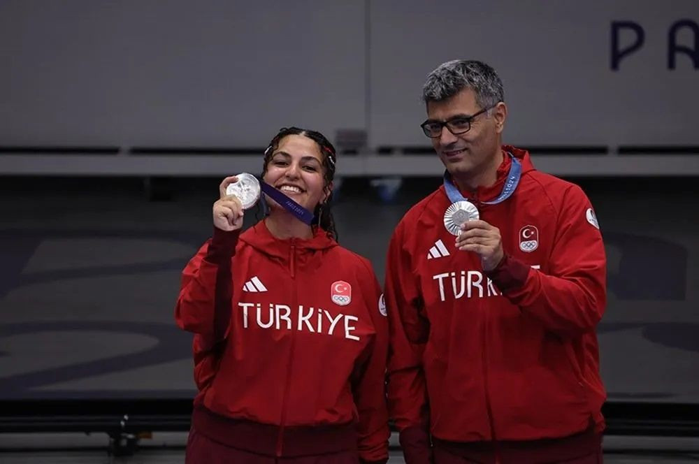 Turkish Olympic shooter goes insanely viral for not wearing special equipment - Page 2