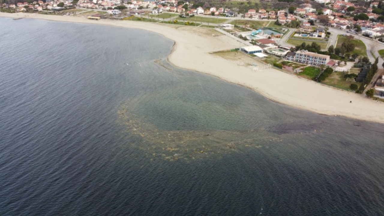 Aegean Sea recedes after strong winds, revealing 2,500-year-old port