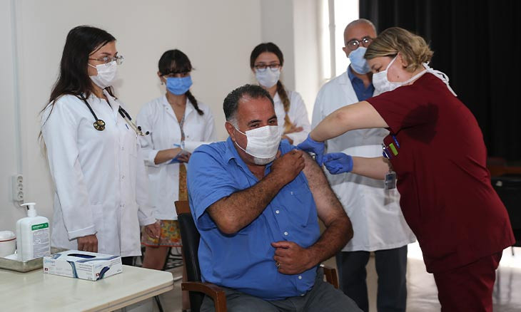 Turkey administers first coronavirus vaccine on volunteer health worker